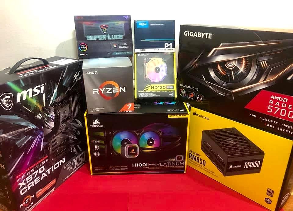 PC parts ready for a custom build at the Computer Servicing workshop: AMD Ryzen 7, Gigabyte graphics card, Corsair power supply and cooling